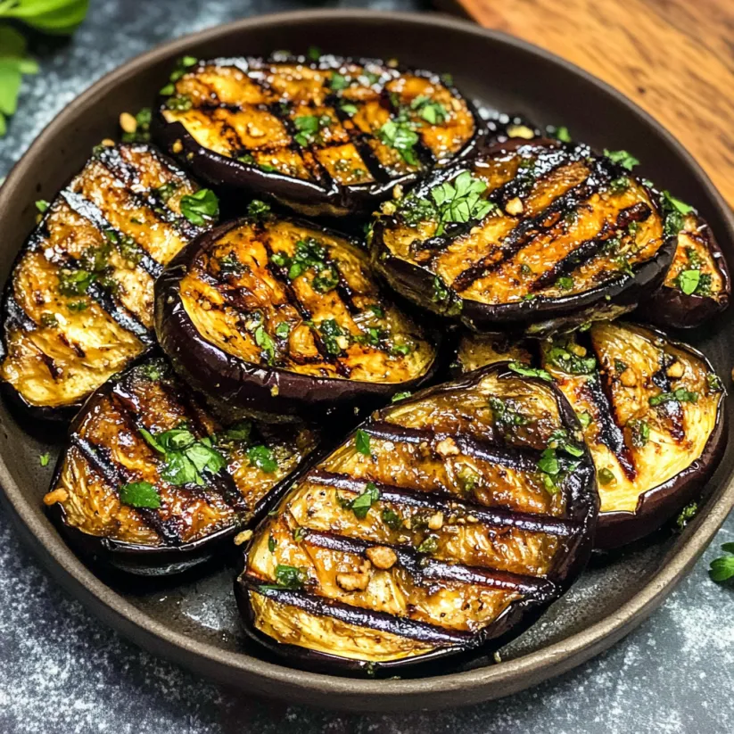 A bowl of grilled eggplant.