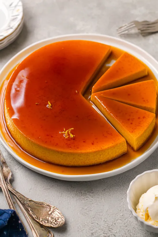 A slice of cake with a sauce on it.