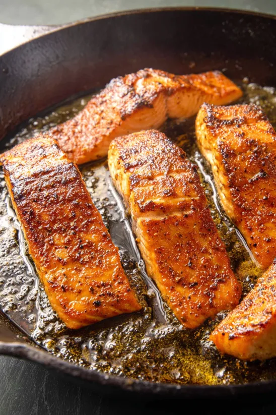A pan of cooked salmon.