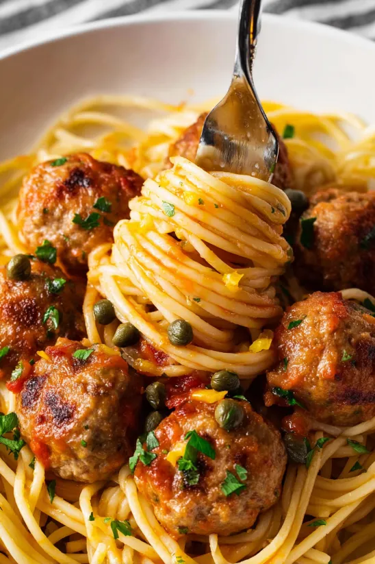 A plate of chicken piccata meatballs.