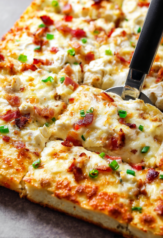 A slice of pizza with cheese and bacon on it.