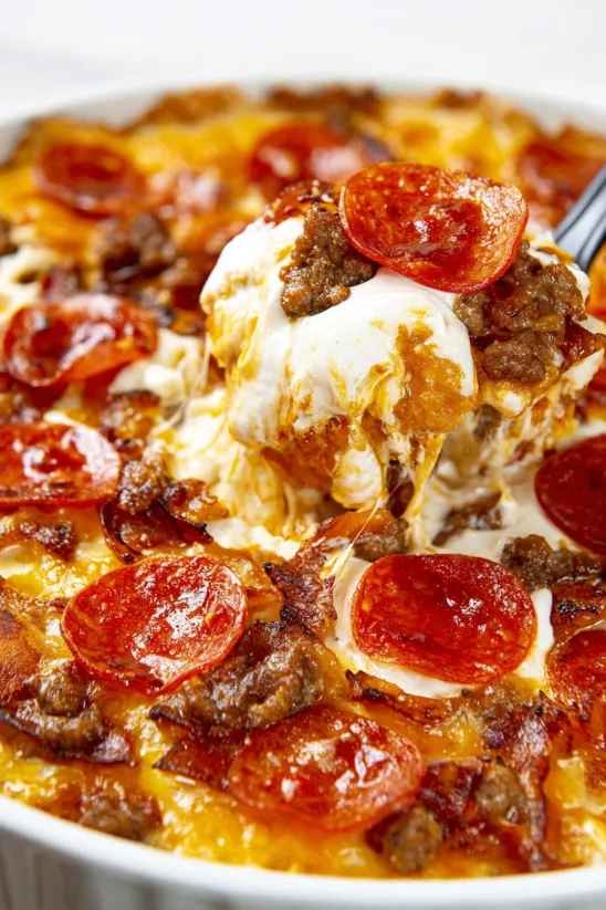 A slice of pizza with pepperoni and cheese.