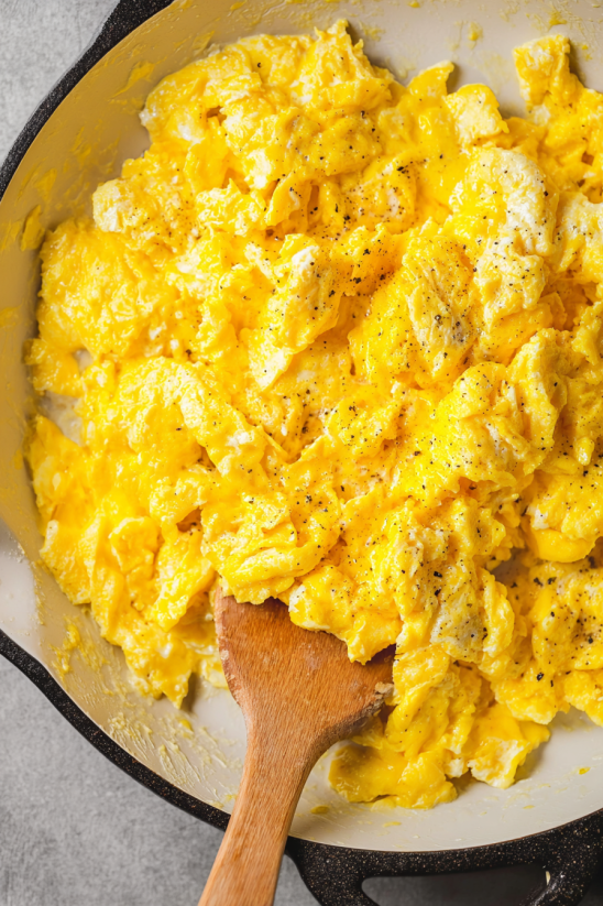 A bowl of scrambled eggs.