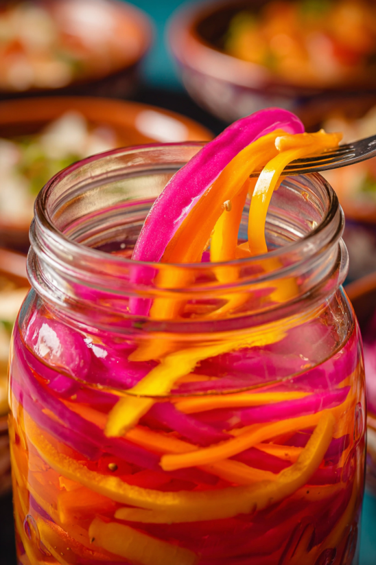 A fork is in a jar of food.