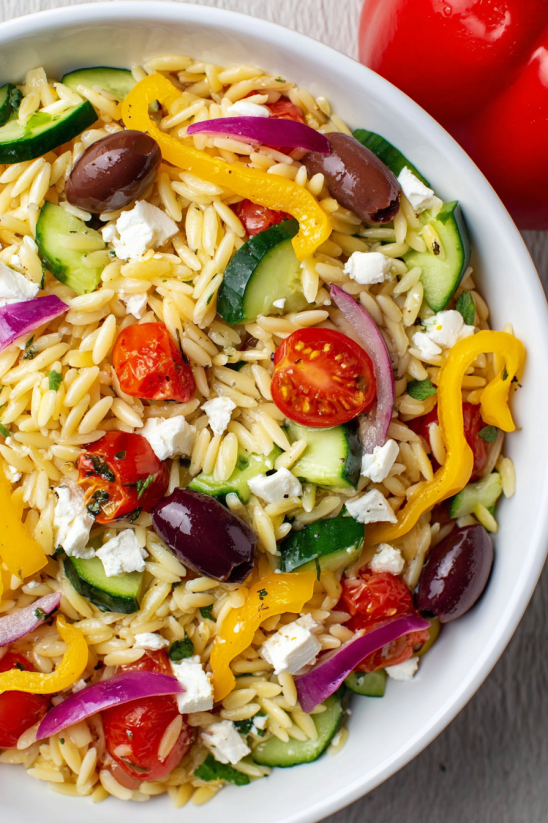 A bowl of Mediterranean Orzo Pasta Salad.