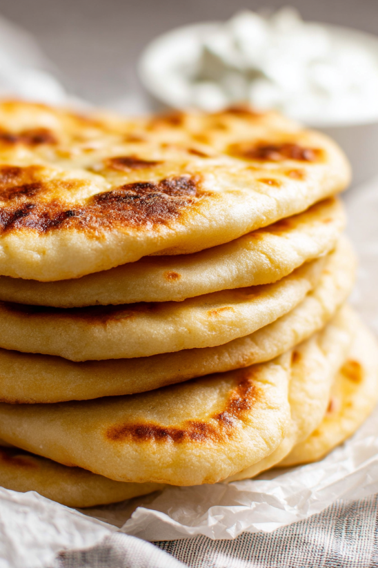 A stack of homemade pita bread.