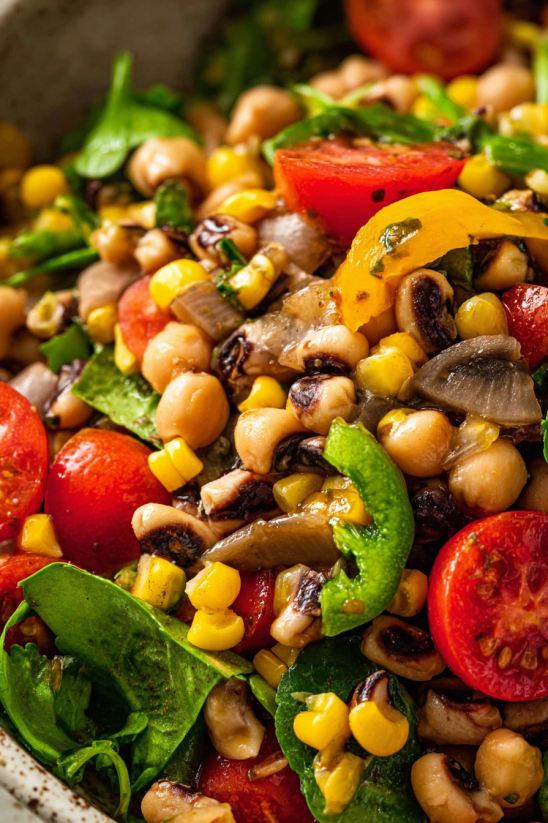 A dish of Texas caviar with tomatoes, corn, and black beans.