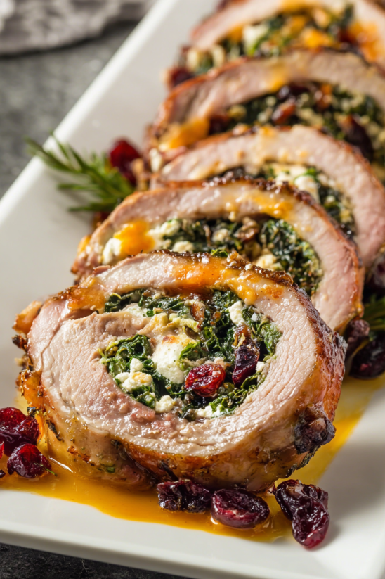 Stuffed pork loin with greens and cheese.
