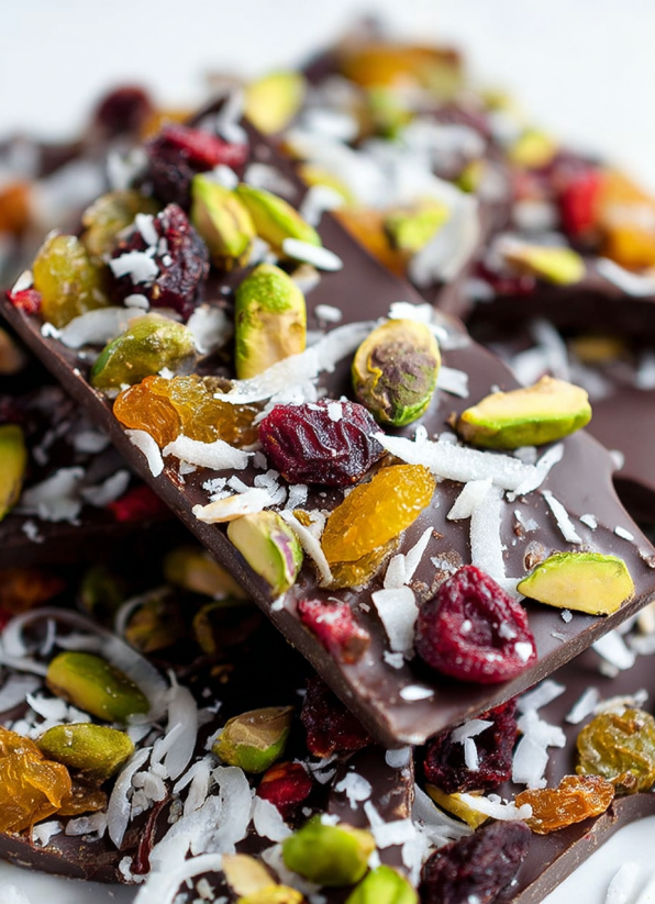 A chocolate bar with nuts and fruit.