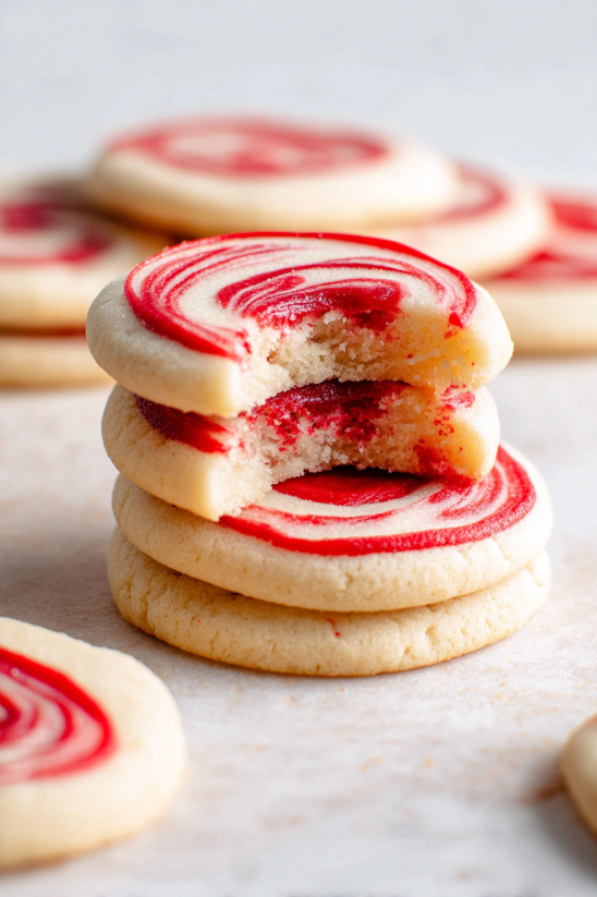 A stack of cookies with red and white stripes.