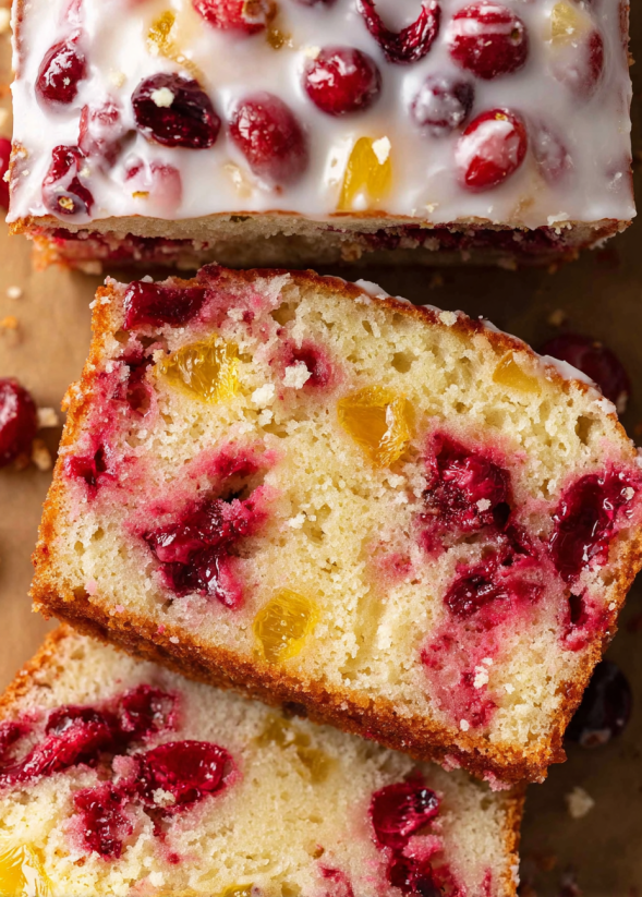 A slice of cake with fruit on top.