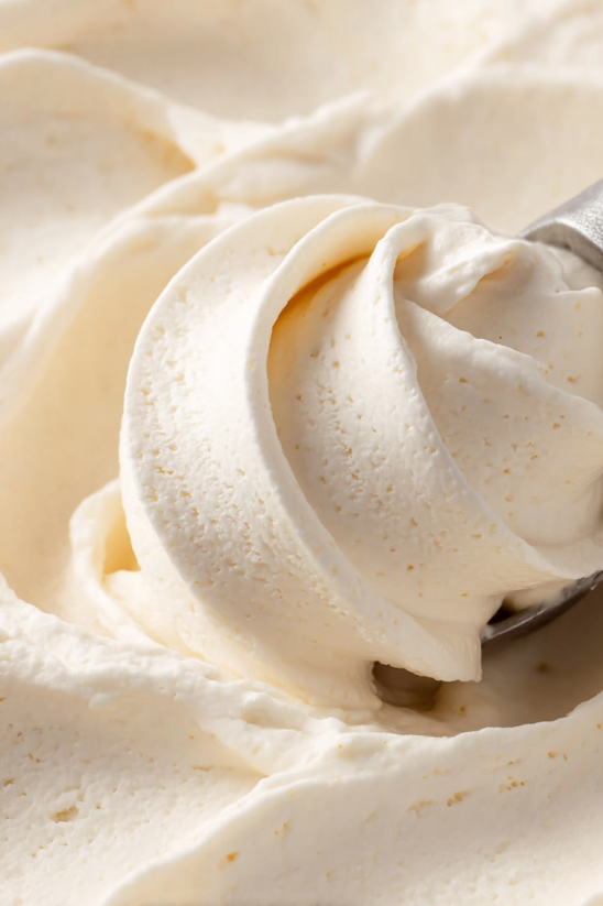 A scoop of ice cream in a bowl.
