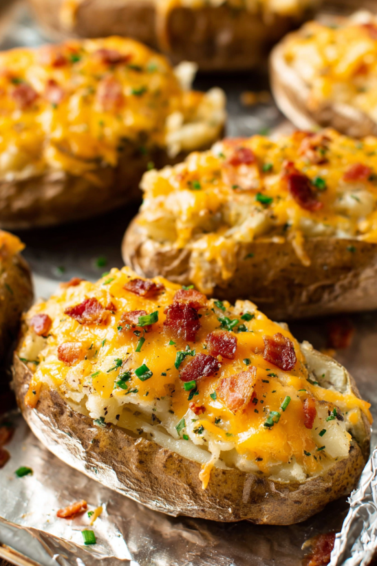 Twice baked potatoes with cheese and bacon.