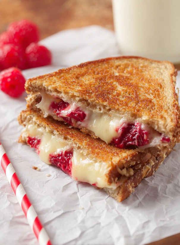 A grilled cheese sandwich with raspberry chipotle bacon.
