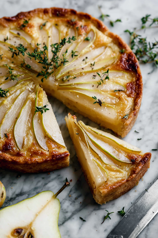 A slice of pear cake with cinnamon sugar.