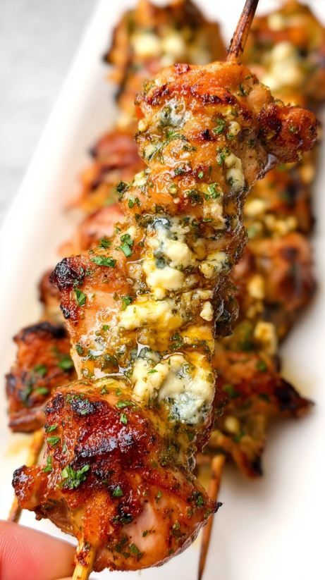 Skewers of chicken with ranch, garlic and Parmesan cheese.