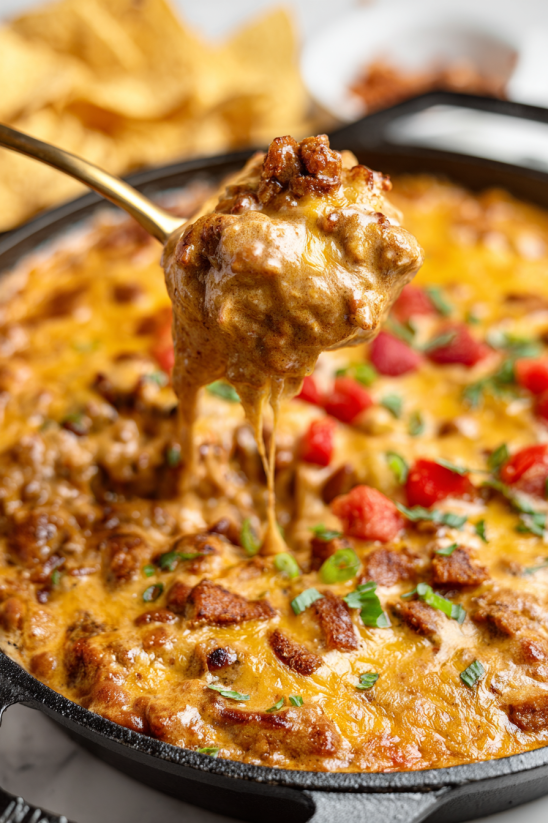 A spoonful of Frito chili cheese dip.