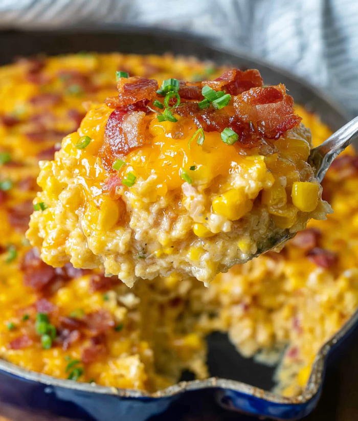 A spoon is in a bowl of food.