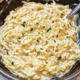 A bowl of creamy garlic parmesan orzo.