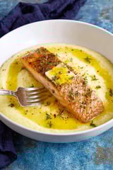 A piece of fish on a fork.