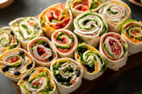 A variety of wraps on a table.